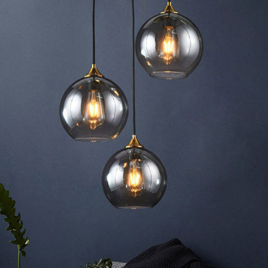 Antiqued Brass Globe Pendant Lamp with 3 Lights and Glass Shade