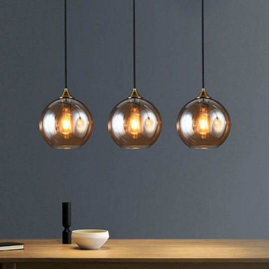 Antiqued Brass Globe Pendant Lamp with 3 Lights and Glass Shade