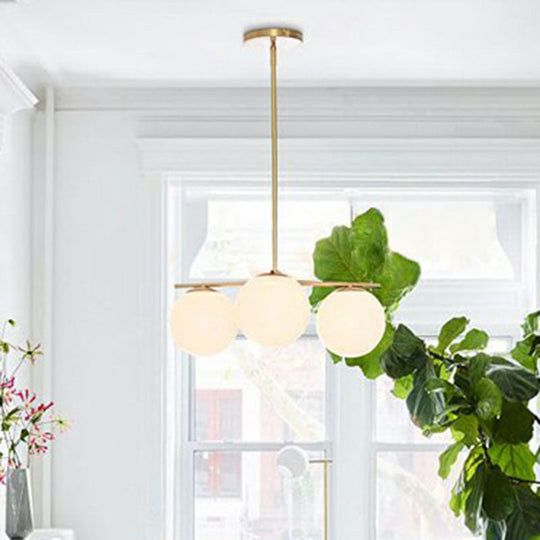 Minimalist Gold Ball Chandelier With Cream Glass Shades - 3-Head Suspension Light