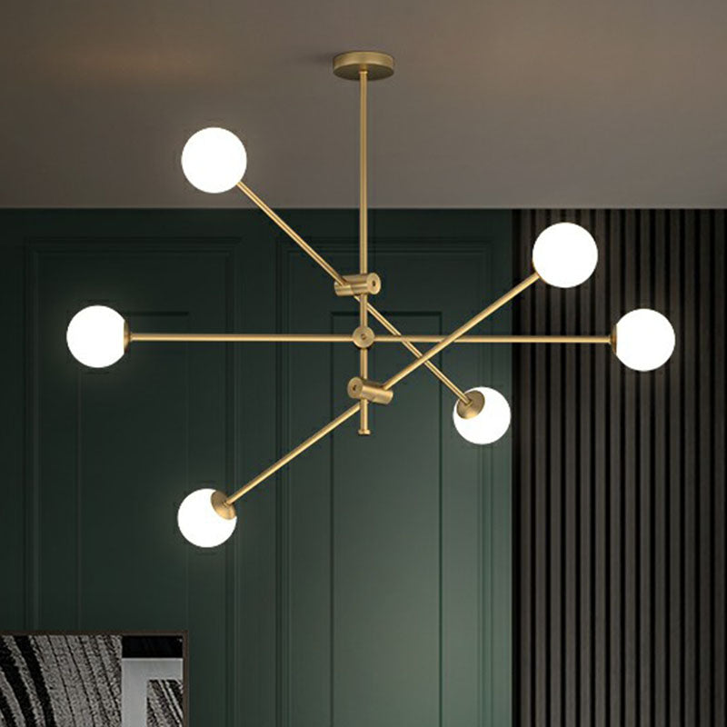 Minimalist Brass Finish Chandelier With Swivel Arm And Glass Shade