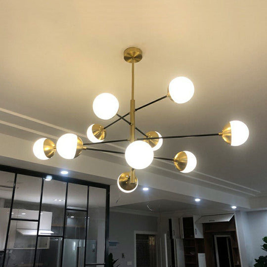 Postmodern Gold-Toned Tiered Restaurant Chandelier With White Glass Balls - Hanging Light Fixture