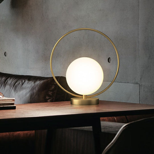 White Glass Ball Bedside Lamp With Gold Ring Decor - Single Minimalistic Table Light