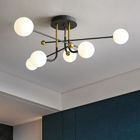 Sleek Cream Glass Ball Semi Mount Ceiling Light With Minimalistic Black And Brass Accents For Dining