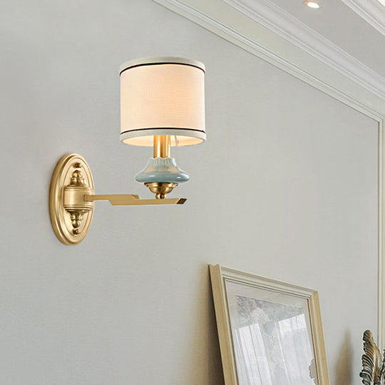 Retro Gold Fabric Wall Sconce With Porcelain Cap - Cylindrical 1/2-Light Lamp For Porch