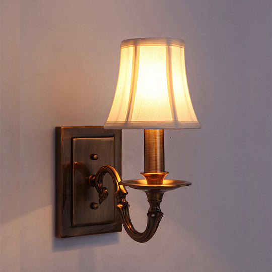 Traditional Copper Wall Sconce With Paneled Bell Design And Fabric Shade For Bedroom Lighting 1 /