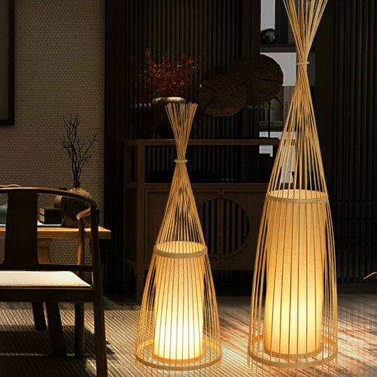 Bamboo Floor Lamp From South-East Asia With Tapered Design And Cylindrical Shade