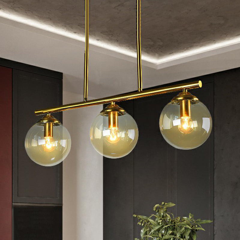 Postmodern Brass Island Light With Globe Glass Shade: Stylish Metal Ceiling Fixture