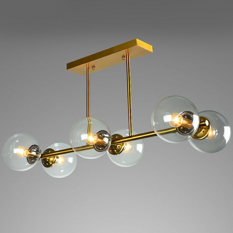 Postmodern Brass Island Light With Globe Glass Shade: Stylish Metal Ceiling Fixture