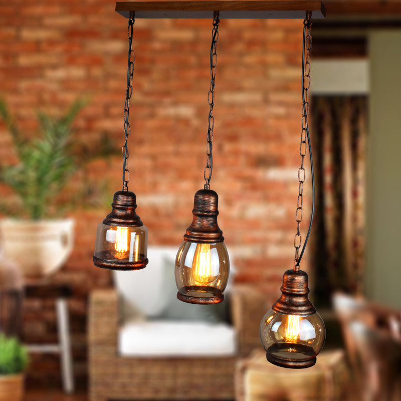 Rustic Clear Glass Pendant Light for Coffee Shop Ceiling - 1 Light, Rust Bottle Shade, Multi Pendant, Linear Canopy