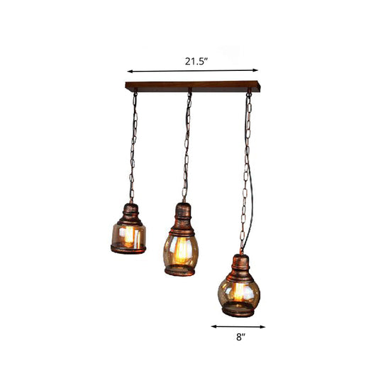 Rustic Clear Glass Pendant Light for Coffee Shop Ceiling - 1 Light, Rust Bottle Shade, Multi Pendant, Linear Canopy