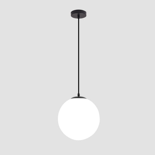 Sleek Black Sphere Restaurant Pendant Light with Cream Glass Shade - Simple Ceiling Hang Lamp