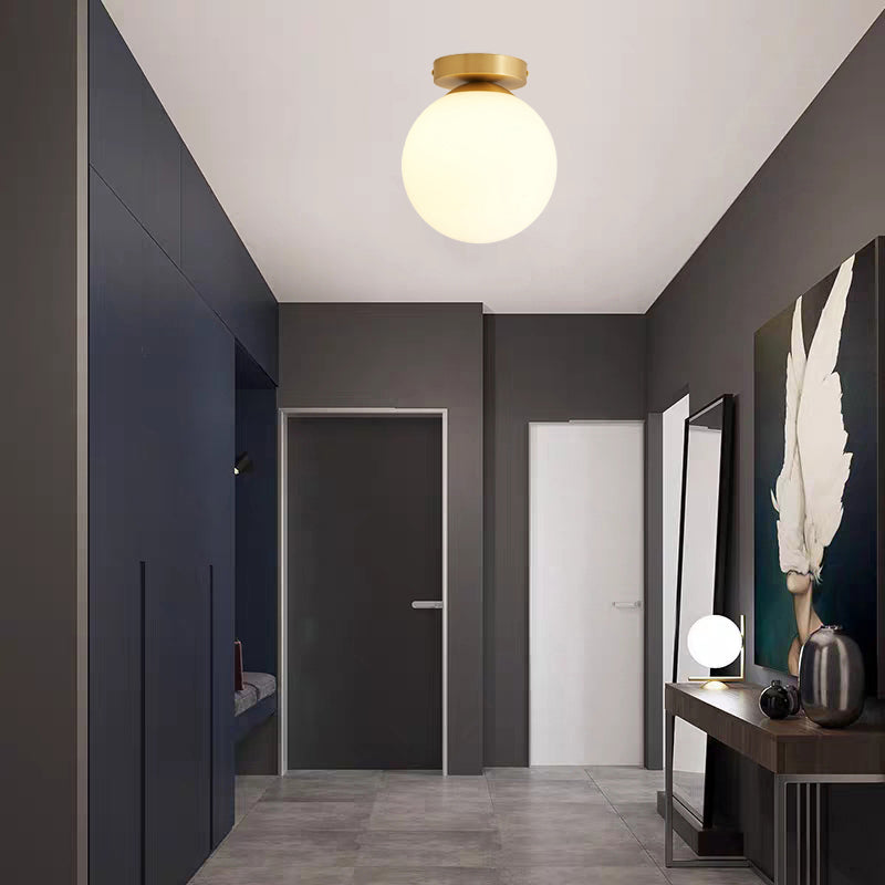 Sleek Minimalist Single Entryway Flush Mount Ceiling Light With Gold Accent & White Glass