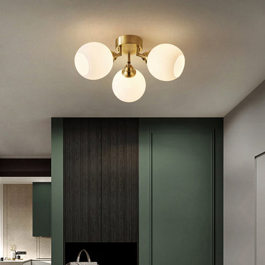 Sleek Brass Domed Semi Flush Mount Ceiling Lamp with Cream Glass - Stylish Bedroom Lighting