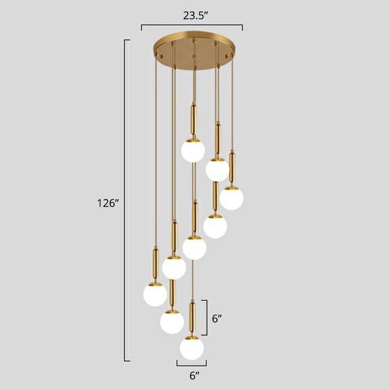 Gold Multi Hanging Stairway Light with Minimalist White Glass Ball Pendant