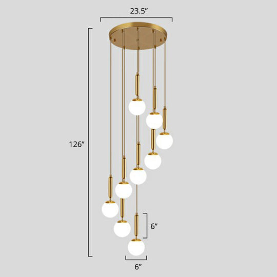 Gold Multi Hanging Stairway Light with Minimalist White Glass Ball Pendant