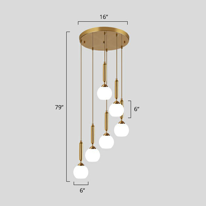 Gold Multi Hanging Stairway Light with Minimalist White Glass Ball Pendant