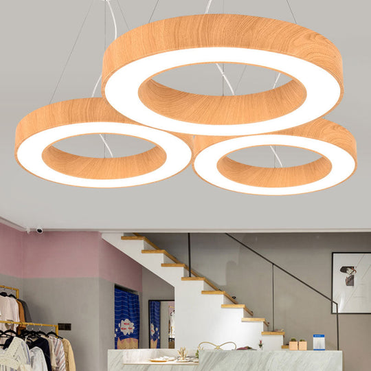 Minimalist LED Pendant Lamp for Meeting Rooms: Light Wood Circle Design with Metal Accents