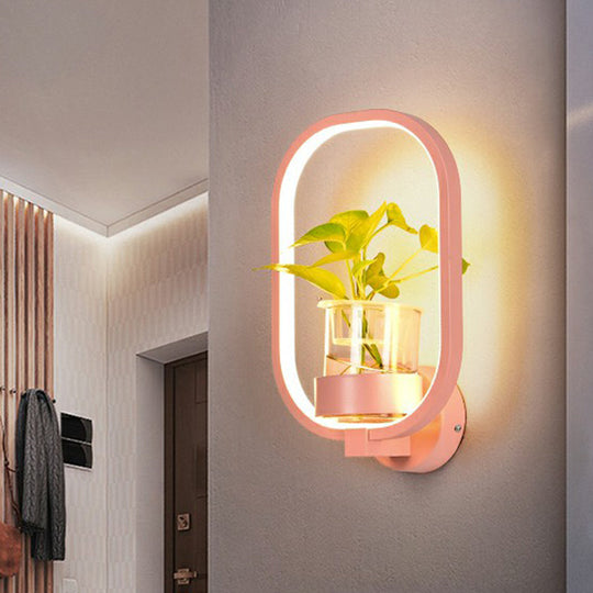 Modern Metal Wall Sconce With Artistic Loop Design And Clear Glass Plant Pot Pink / Third Gear