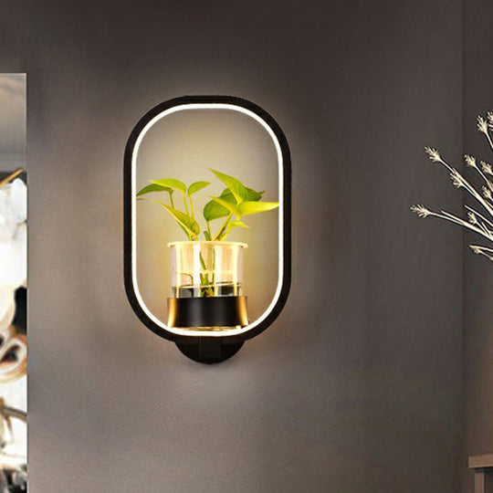 Modern Metal Wall Sconce With Artistic Loop Design And Clear Glass Plant Pot Black / Third Gear