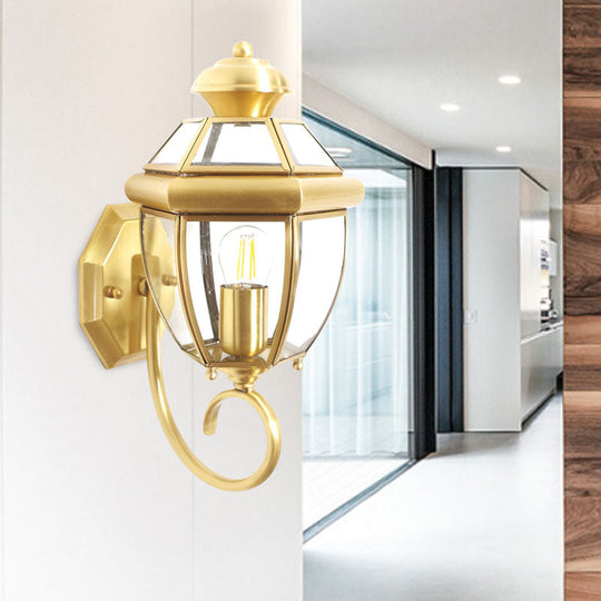 Brass Wall Sconce With Clear Glass Urn And Curved Arm Single Bulb Light Fixture