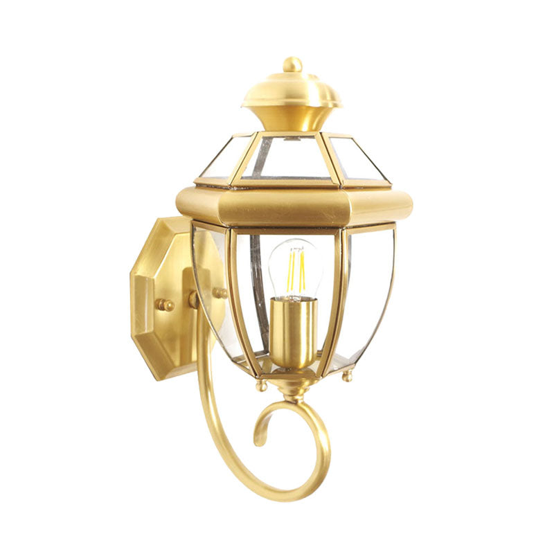 Brass Wall Sconce With Clear Glass Urn And Curved Arm Single Bulb Light Fixture