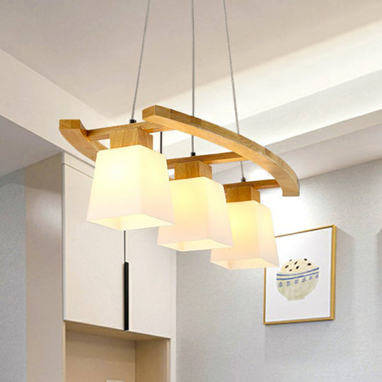 Nordic Wood Island Pendant Ceiling Light With Trapezoid White Glass Shade - 3-Light Dining Room