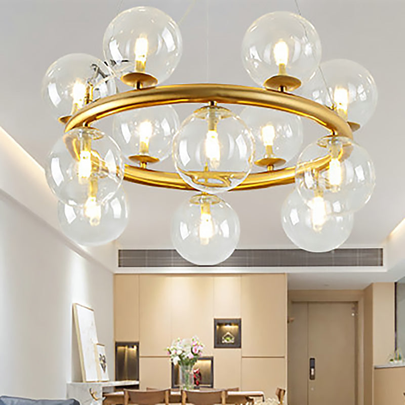 Modern 12-Bulb Gold Chandelier With Clear Glass Shade - Stylish Globe Suspension Light