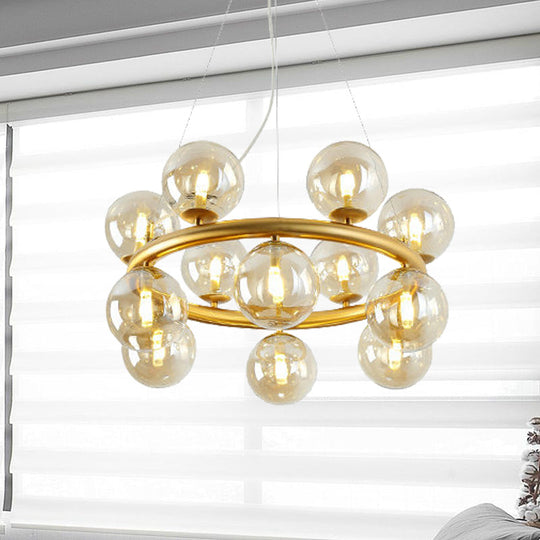 Modern 12-Bulb Gold Chandelier With Clear Glass Shade - Stylish Globe Suspension Light