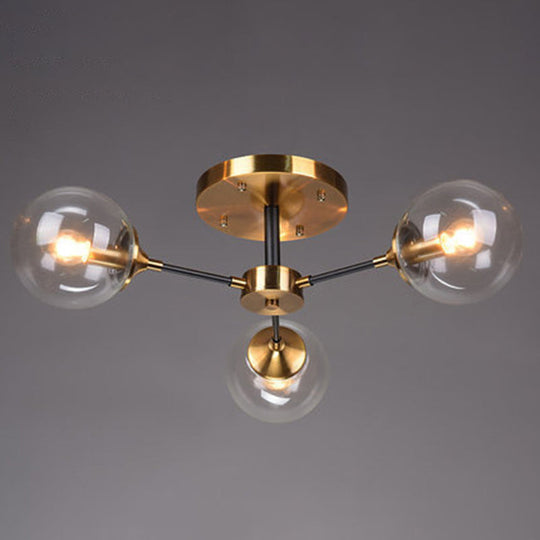 Postmodern Brass Finish Radial Ceiling Lamp With Glass Ball Shade 3 / Clear