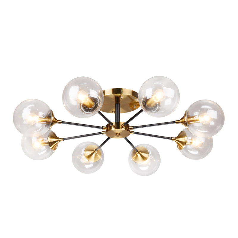 Postmodern Brass Flush Mount Light with Burst Design and Glass Ball for Living Room