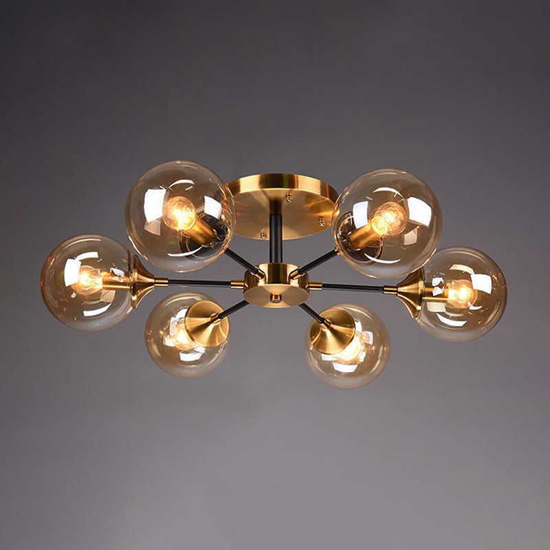 Postmodern Brass Flush Mount Light with Burst Design and Glass Ball for Living Room