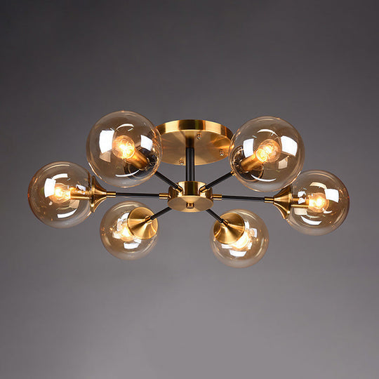 Postmodern Brass Flush Mount Light With Burst Design And Glass Ball For Living Room