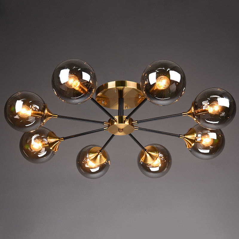 Postmodern Brass Flush Mount Light With Burst Design And Glass Ball For Living Room