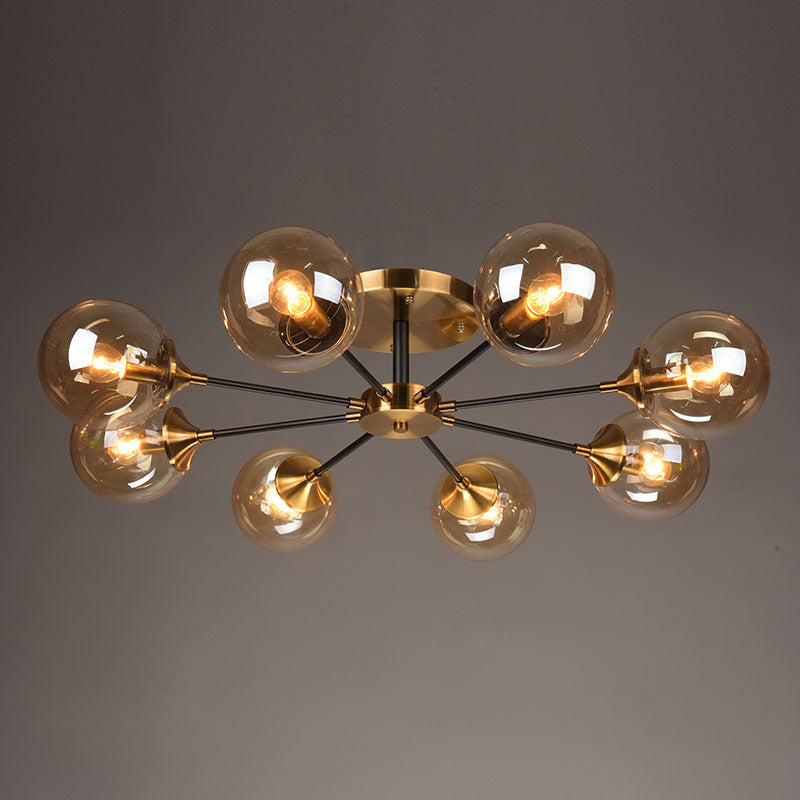 Postmodern Brass Flush Mount Light with Burst Design and Glass Ball for Living Room