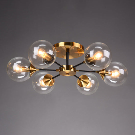 Postmodern Brass Flush Mount Light with Burst Design and Glass Ball for Living Room