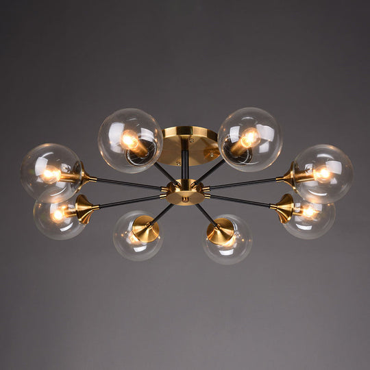 Postmodern Brass Flush Mount Light with Burst Design and Glass Ball for Living Room