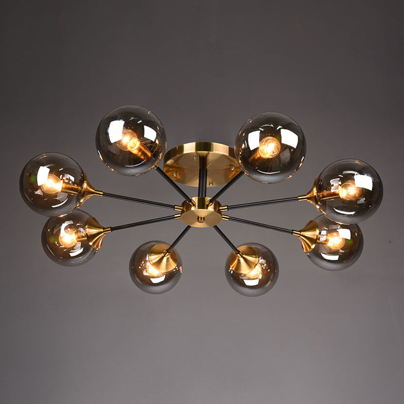 Postmodern Brass Flush Mount Light with Burst Design and Glass Ball for Living Room