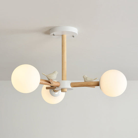 Japanese-Inspired Bedroom Chandelier with Orb Shade, Birds, Wood, and Glass in White