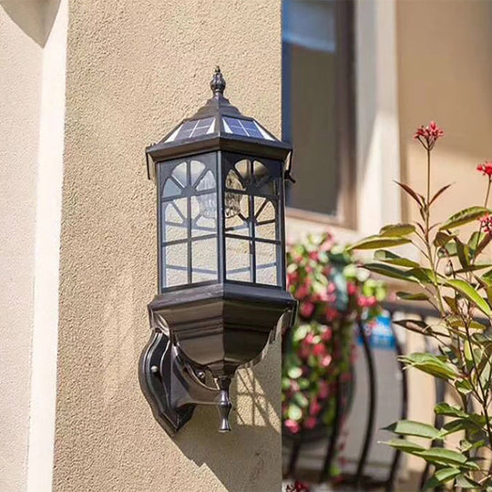 Clear Glass Wall Sconce With Solar Panel For Outdoor Lighting Black