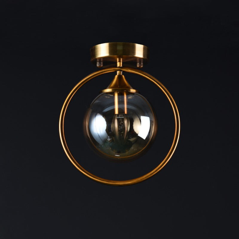 Postmodern Glass Ball Ceiling Light With Brass Metal Ring - 1-Light Semi-Flush Mount For Corridors