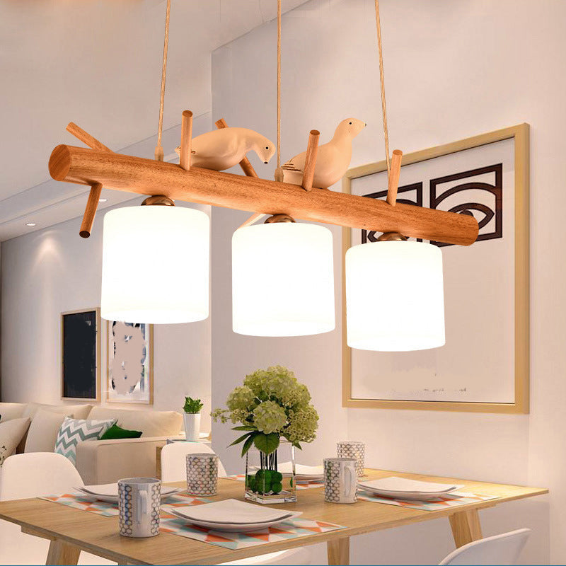 Nordic Wood Pendant Light With Opal Glass Cylinder And Resin Bird Decor