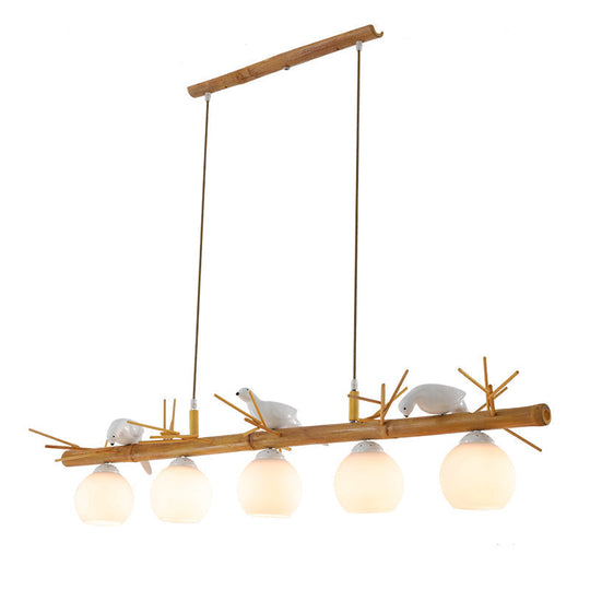 Modern Cream Glass Wood Pendant Light With White Bird Deco - Dome Island Fixture