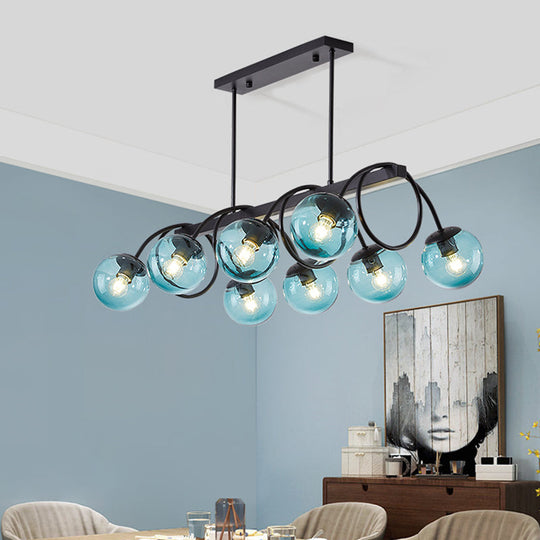 Sleek Black Glass Sphere Island Light For Modern Dining Rooms