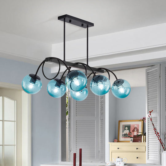 Sleek Black Glass Sphere Island Light For Modern Dining Rooms