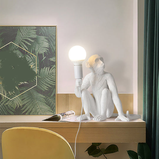 Art Deco 1-Head White Monkey Table Lamp - Stylish Resin Nightstand Light With Unique Shadeless