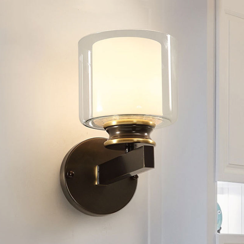 Black 1-Light Wall Sconce - Traditional Metal Cylinder With Double-Tier Glass Shade For Bedroom