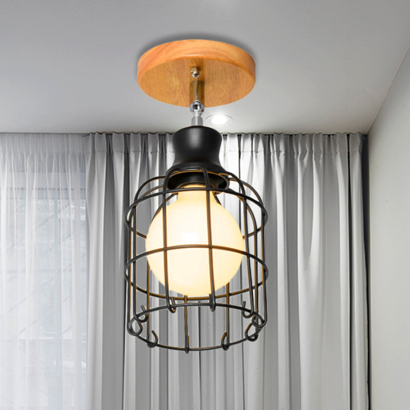 Industrial Loft Ceiling Fixture With Wire Cage And Rotatable Bulb - Black Metallic Semi-Flush Mount