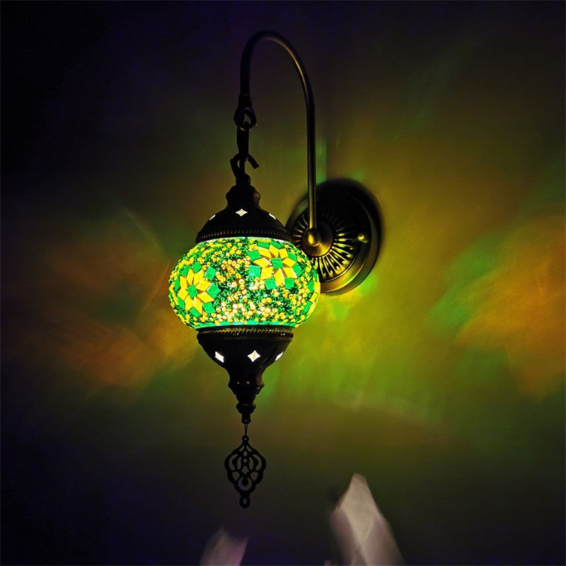 Traditional Bronze 1-Bulb Armed Wall Sconce Light With Global Green Glass Shade