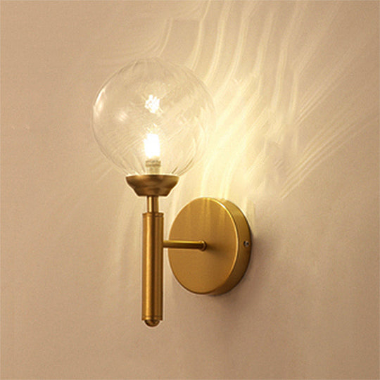 Modern Brass Wall Sconce Light - Clear Glass Sphere For Bedroom