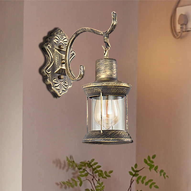 Rustic Wall Mounted Kerosene Light Fixture With Carved Pattern - Aged Bronze Finish Clear Glass